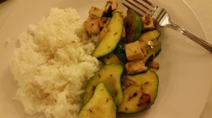 Kohei's pattypan squash, stir fried with garic, freshly ground cayenne peppers, tofu, cumin, and mustard seed.